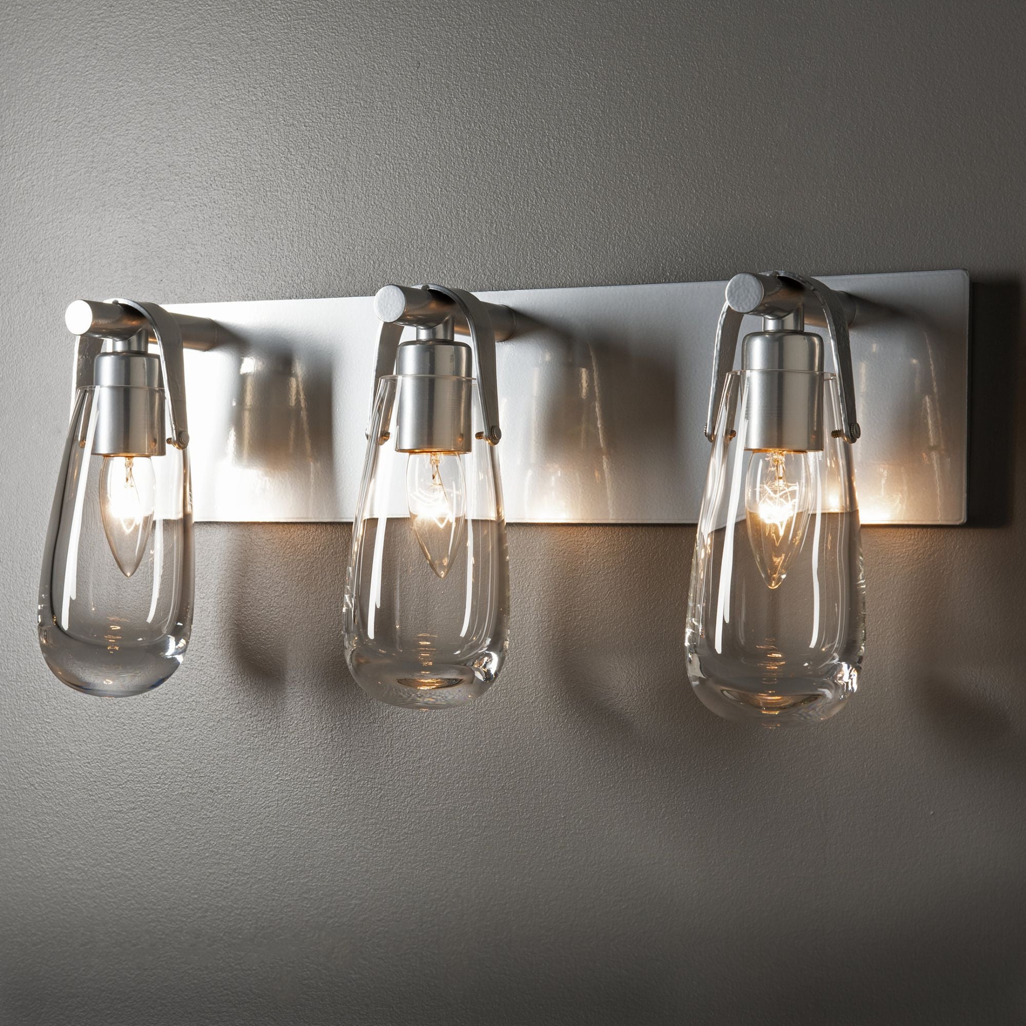 Eos 3-Light Bath Sconce 3-Light Clear Glass (ZM) in Sterling
