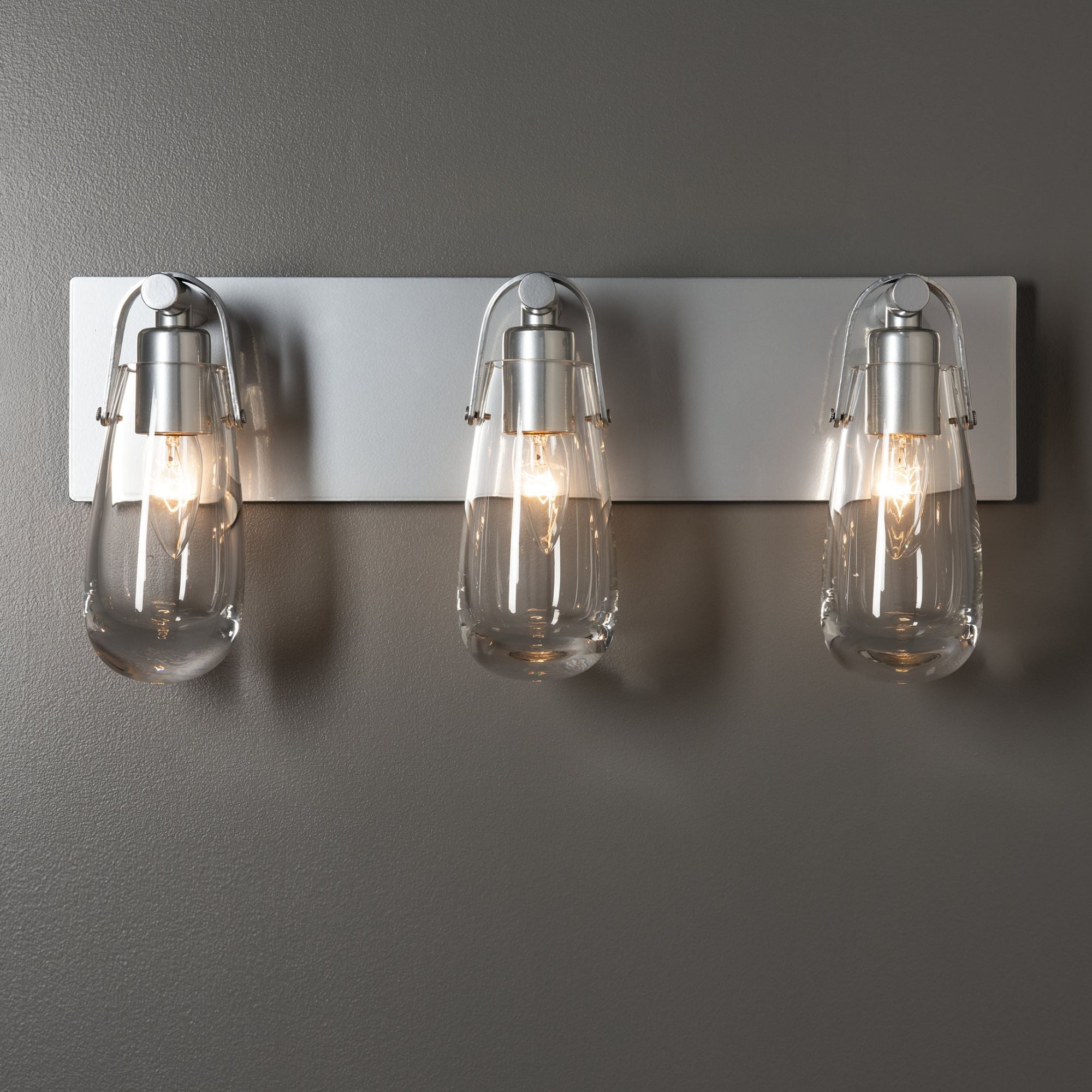 Eos 3-Light Bath Sconce 3-Light Clear Glass (ZM) in Sterling