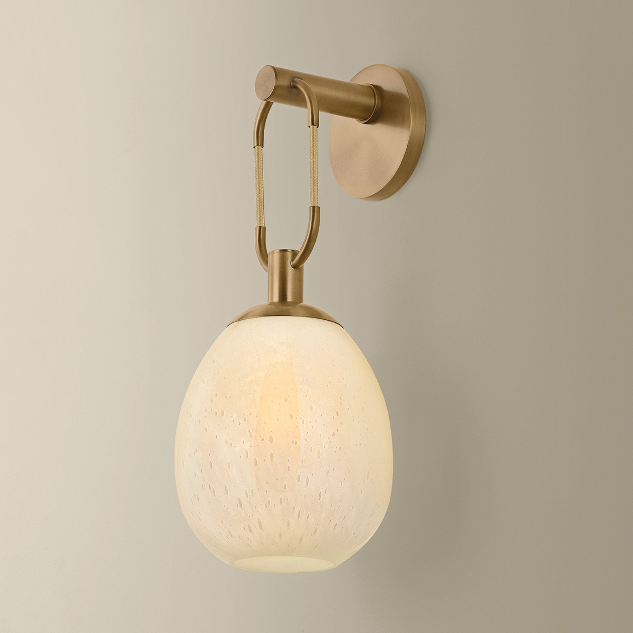 Jove 1-Light Wall Sconce in Patina Brass 7W x 17.25H