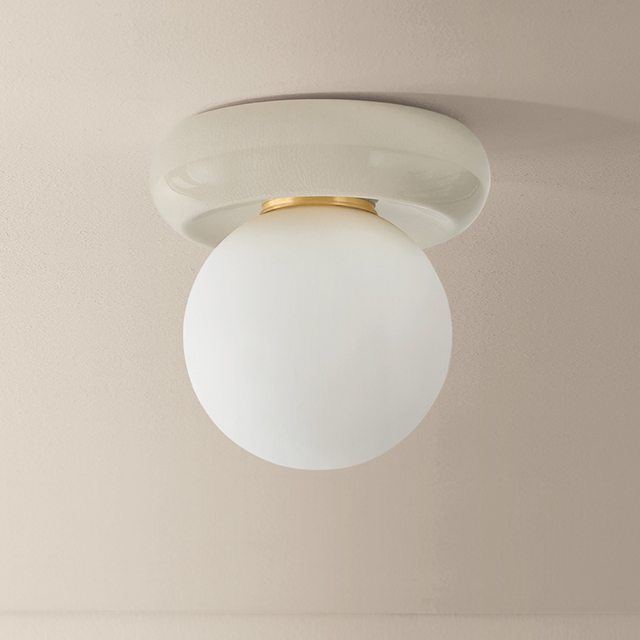 Tyra 1-Light Flush Mount in Aged Brass 8.75W x 9H
