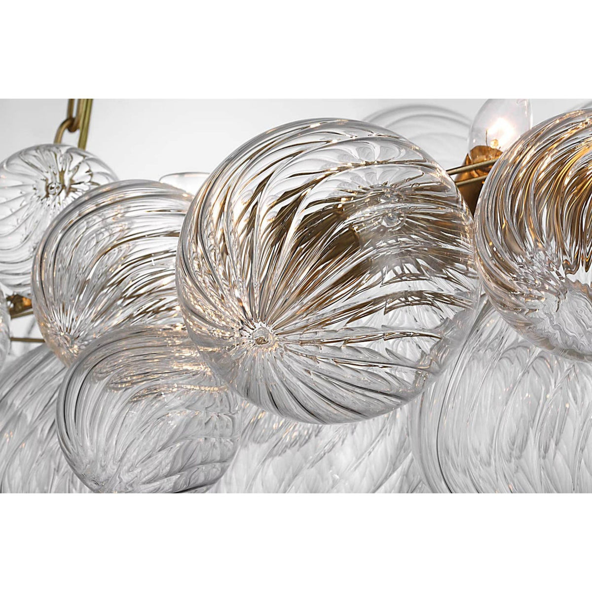 Julie Neill Talia Medium Linear Chandelier in Gild with Clear Swirled Glass W26.25" x 51" x H21.75"