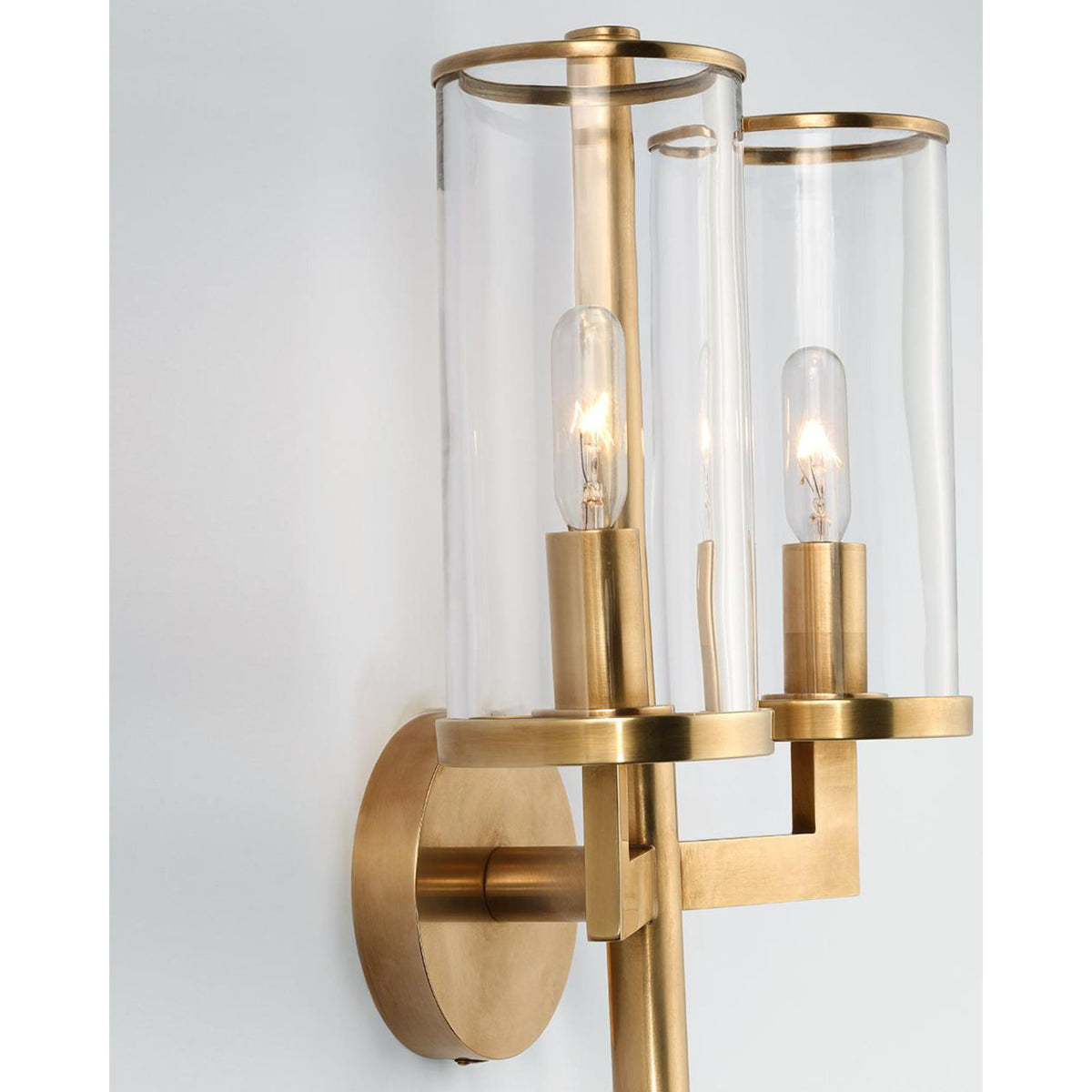 Kelly Wearstler Liaison Double Sconce in Antique-Burnished Brass with Clear Glass W9.5" x H19" x E5.25"