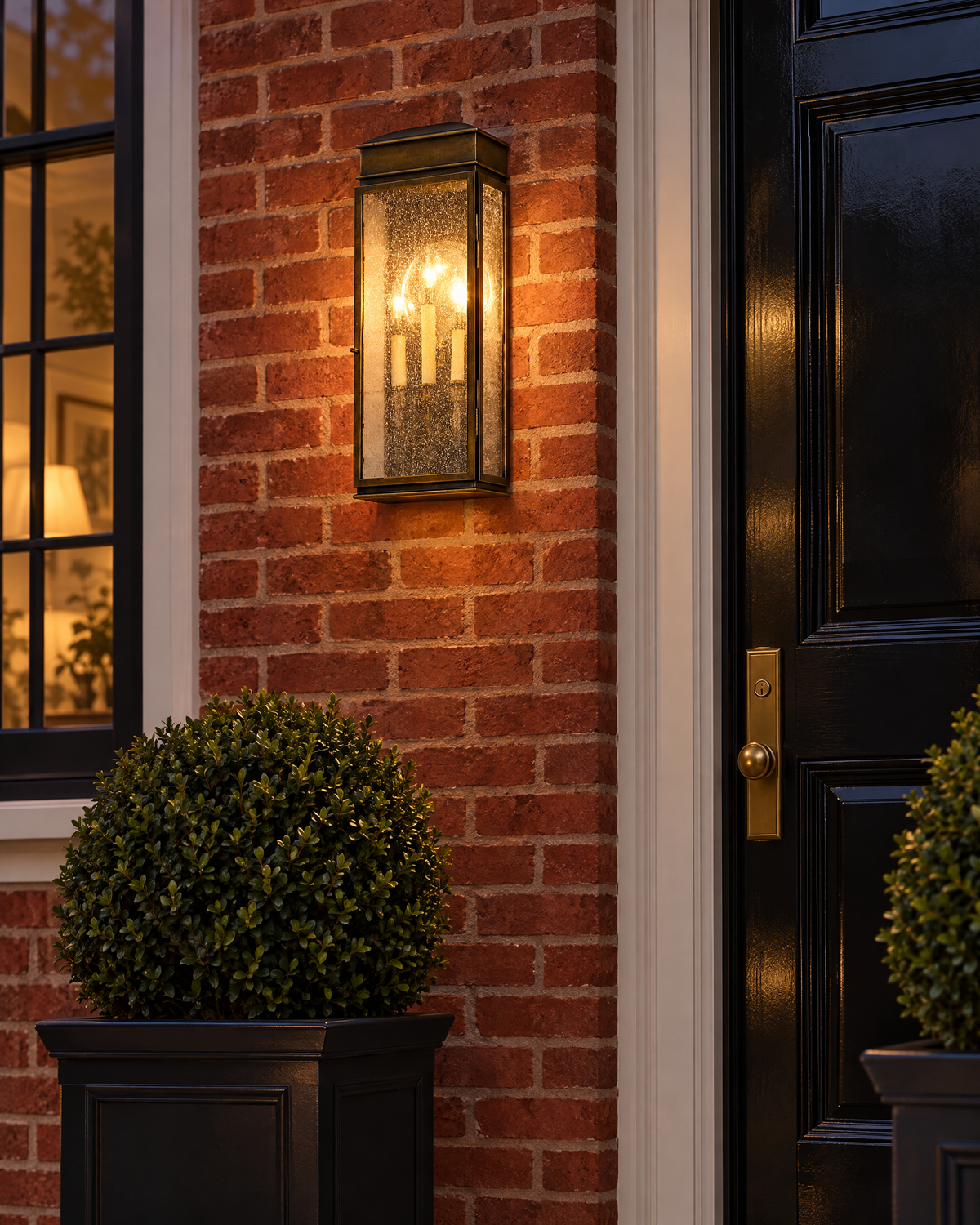 Whitaker outdoor lantern beside a front door