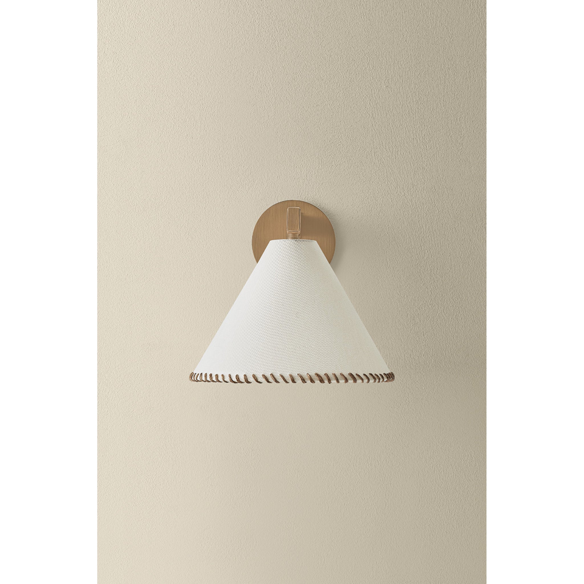 Stoney 1-Light Wall Sconce in Patina Brass 10.25W x 9.25H