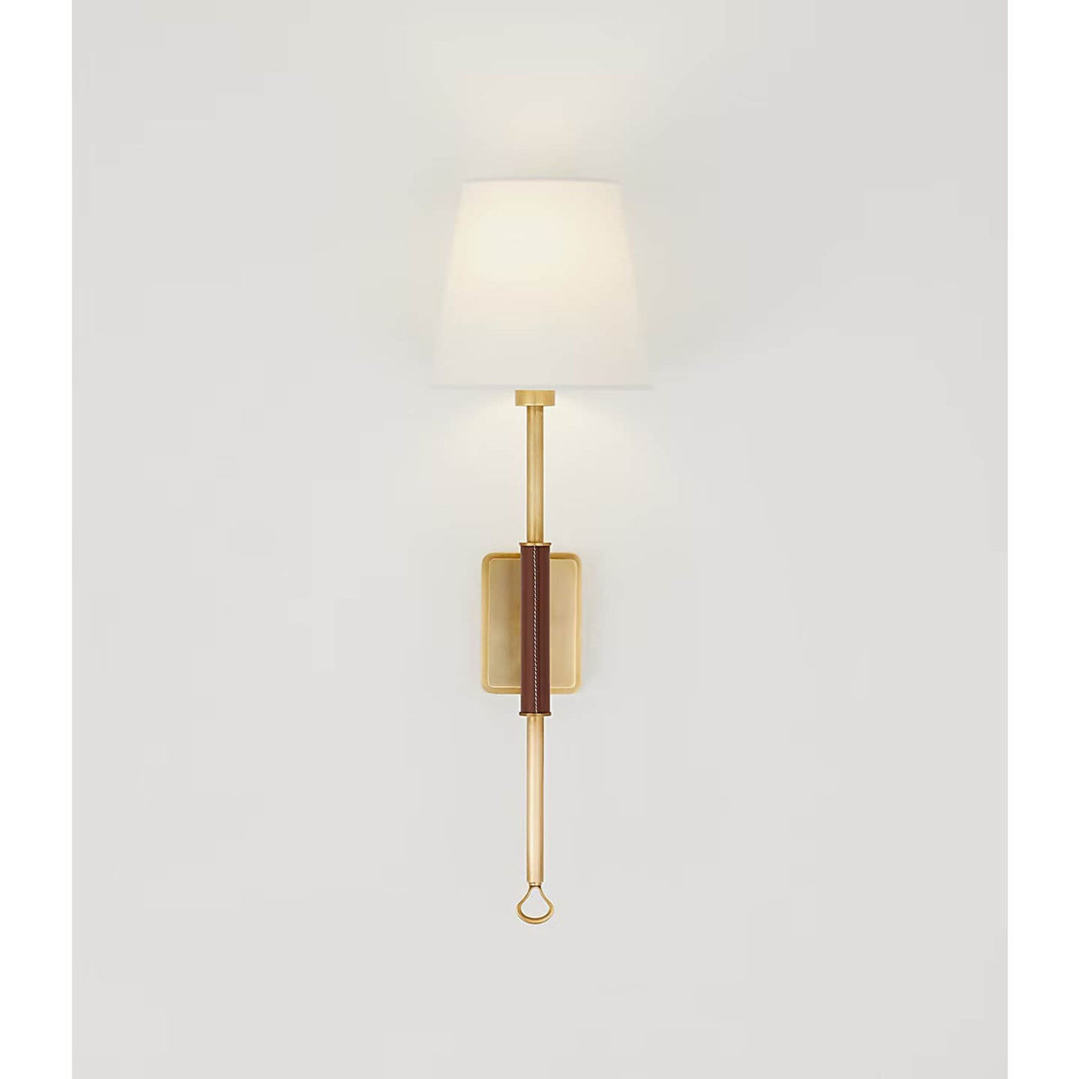 Amber Lewis Griffin Tail Sconce in Hand-Rubbed Antique Brass and Saddle Leather with Linen Shade W6.5" x H21" x E6.5"