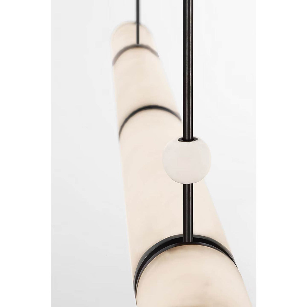 Anne-Marie Barton Marcell 56" Linear Chandelier in Bronze with Alabaster W2.75" x 56"