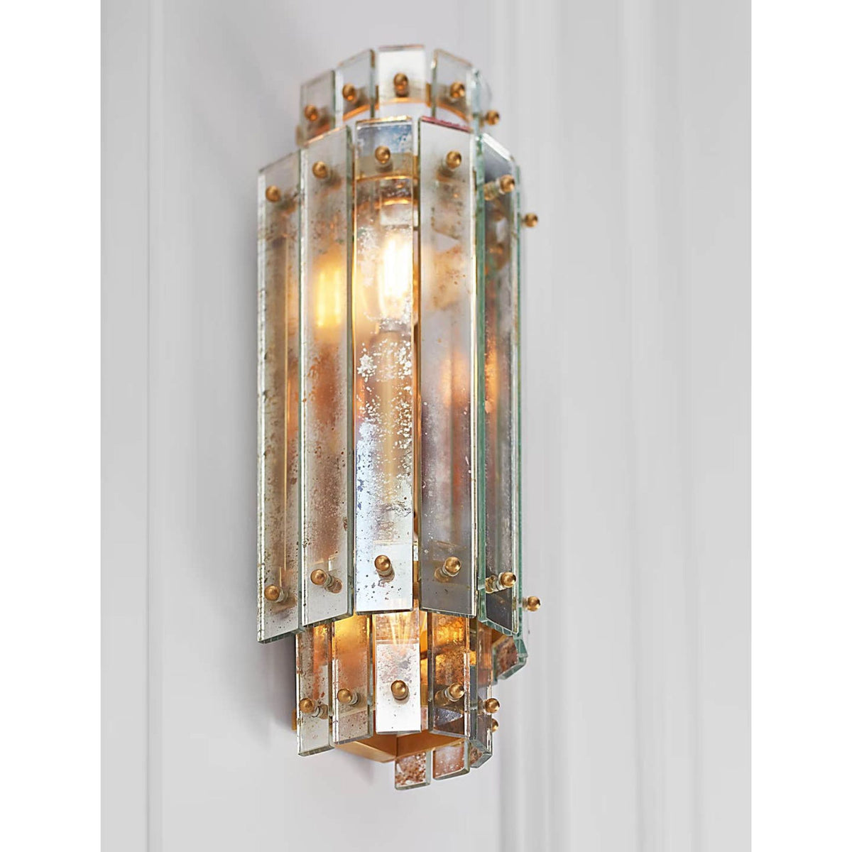Carrier and Company Cadence Small Tiered Sconce in Hand-Rubbed Antique Brass with Antique Mirror W5.5" x H14.5" x E4.75"