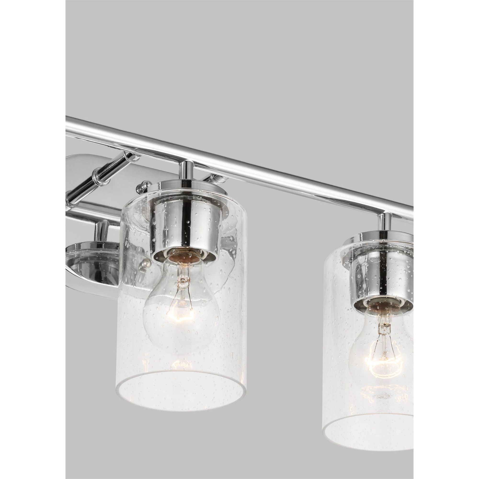 Oslo Three Light Wall / Bath Contemporary Fixture 20" Width 8.5" Height Steel Round Clear Seeded Shade in Chrome