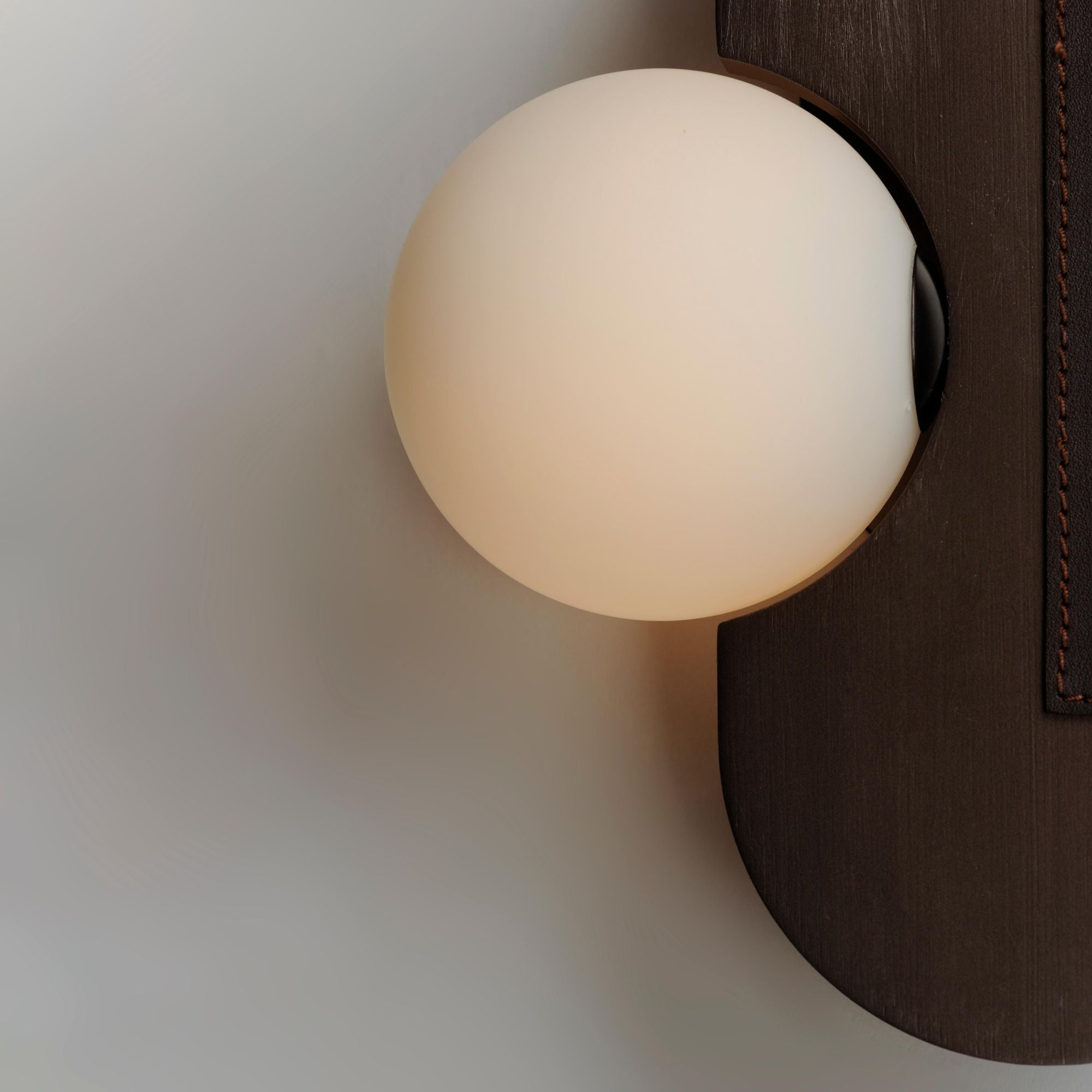 Studio M SM24600BBZ Stitched Side-Light Wall Sconce in Brushed Bronze by Nina Magon