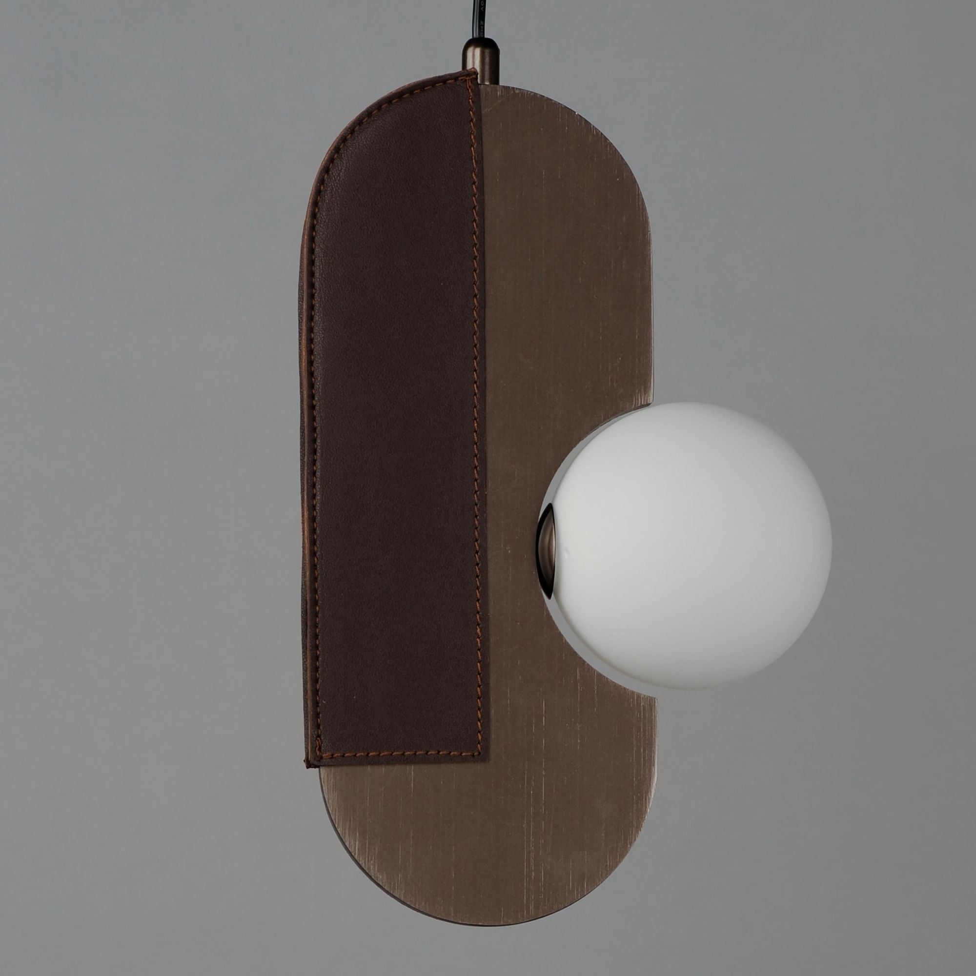 Studio M SM24602BBZ Stitched Side-Light Pendant in Brushed Bronze by Nina Magon