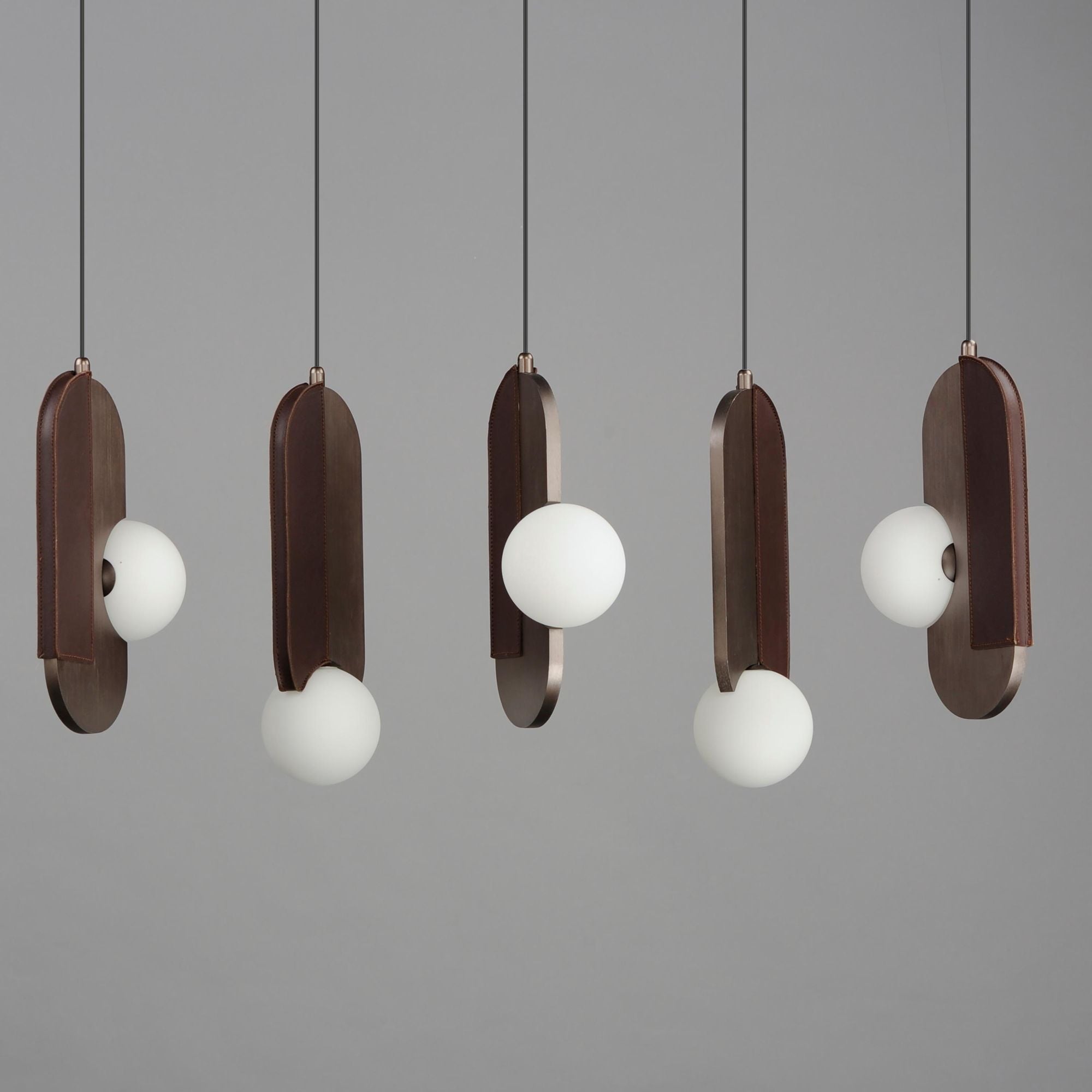 Studio M SM24605BBZ Stitched 5-Light Pendant in Brushed Bronze by Nina Magon