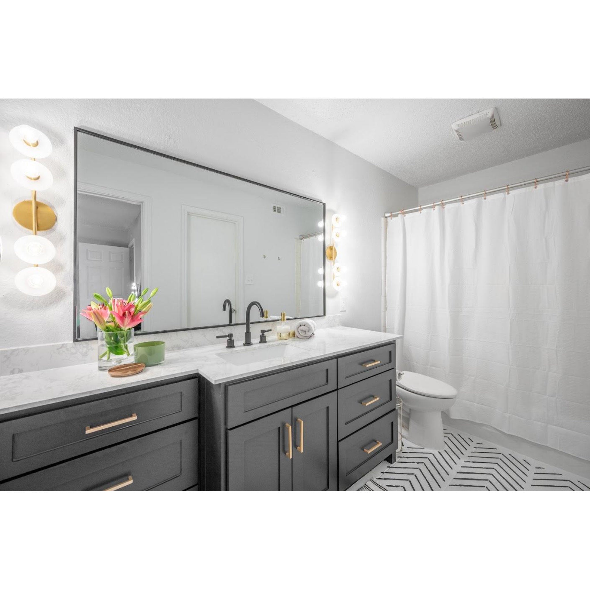 Elmont 4-Light Bath and Vanity in Aged Brass 4.75L x 4.75W x 24.75H