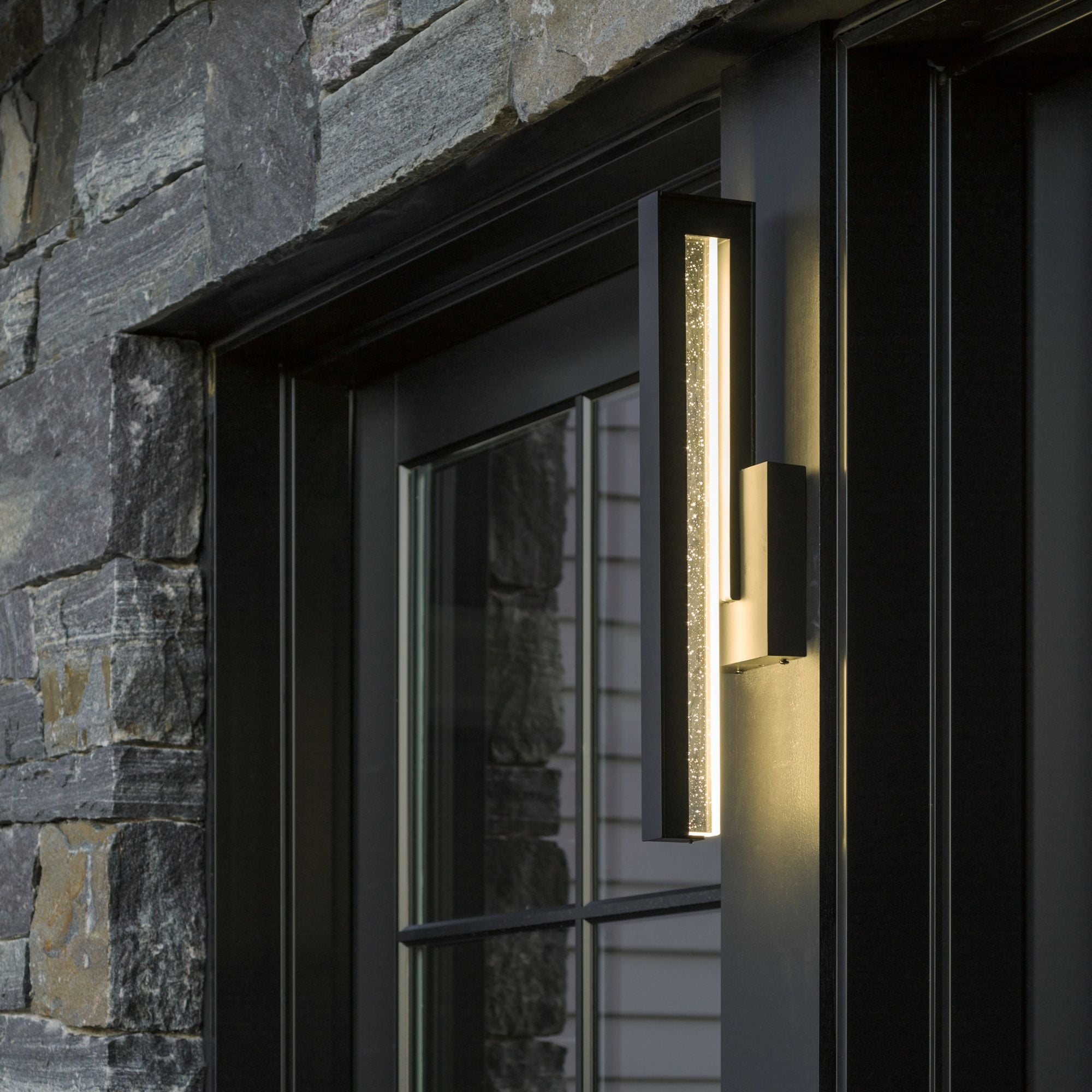 Edge Medium LED Outdoor Sconce LED Seeded Clear Glass (II) in Coastal Black