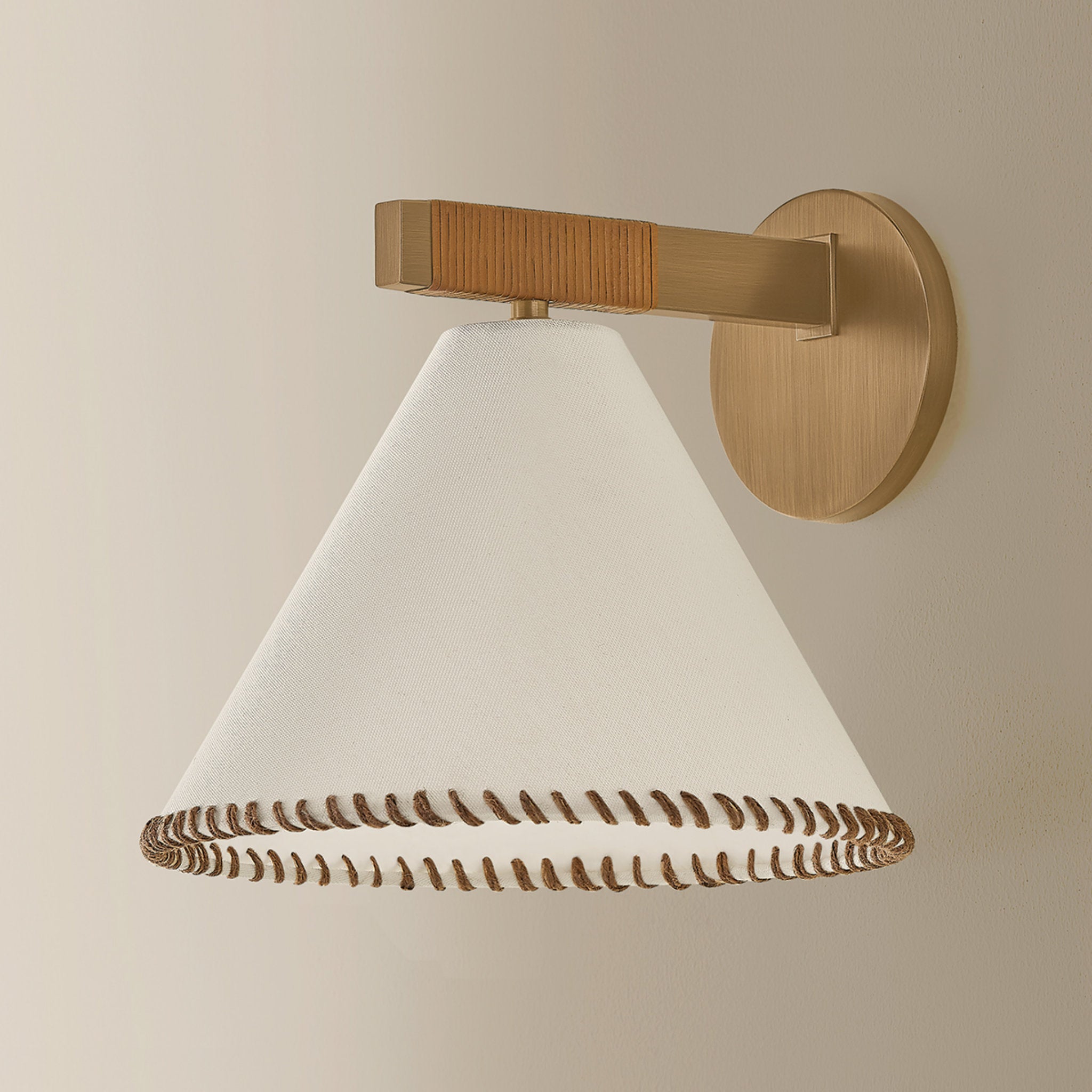 Stoney 1-Light Wall Sconce in Patina Brass 10.25W x 9.25H