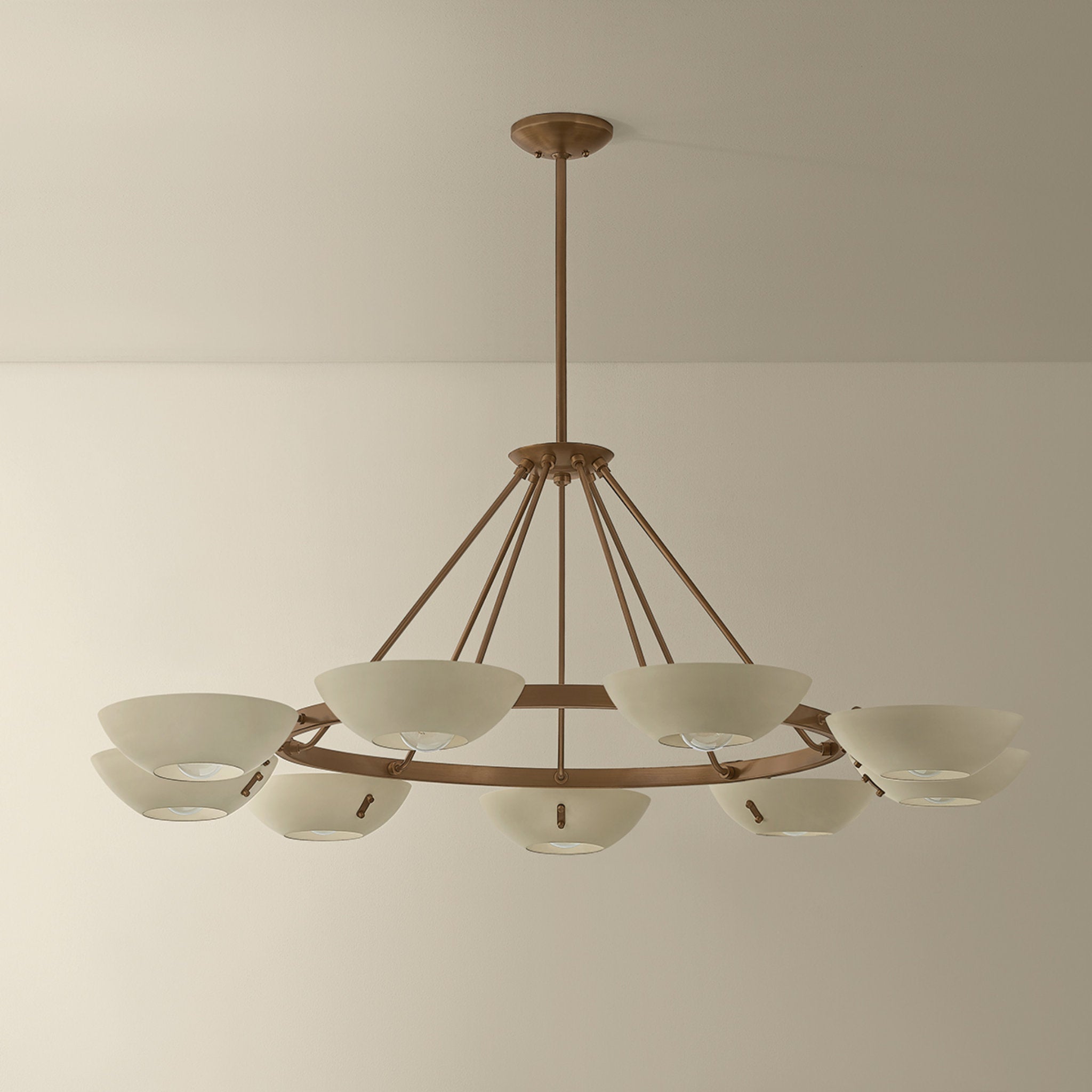 Alturas 9-Light Chandelier in Patina Brass 55W x 20.25H