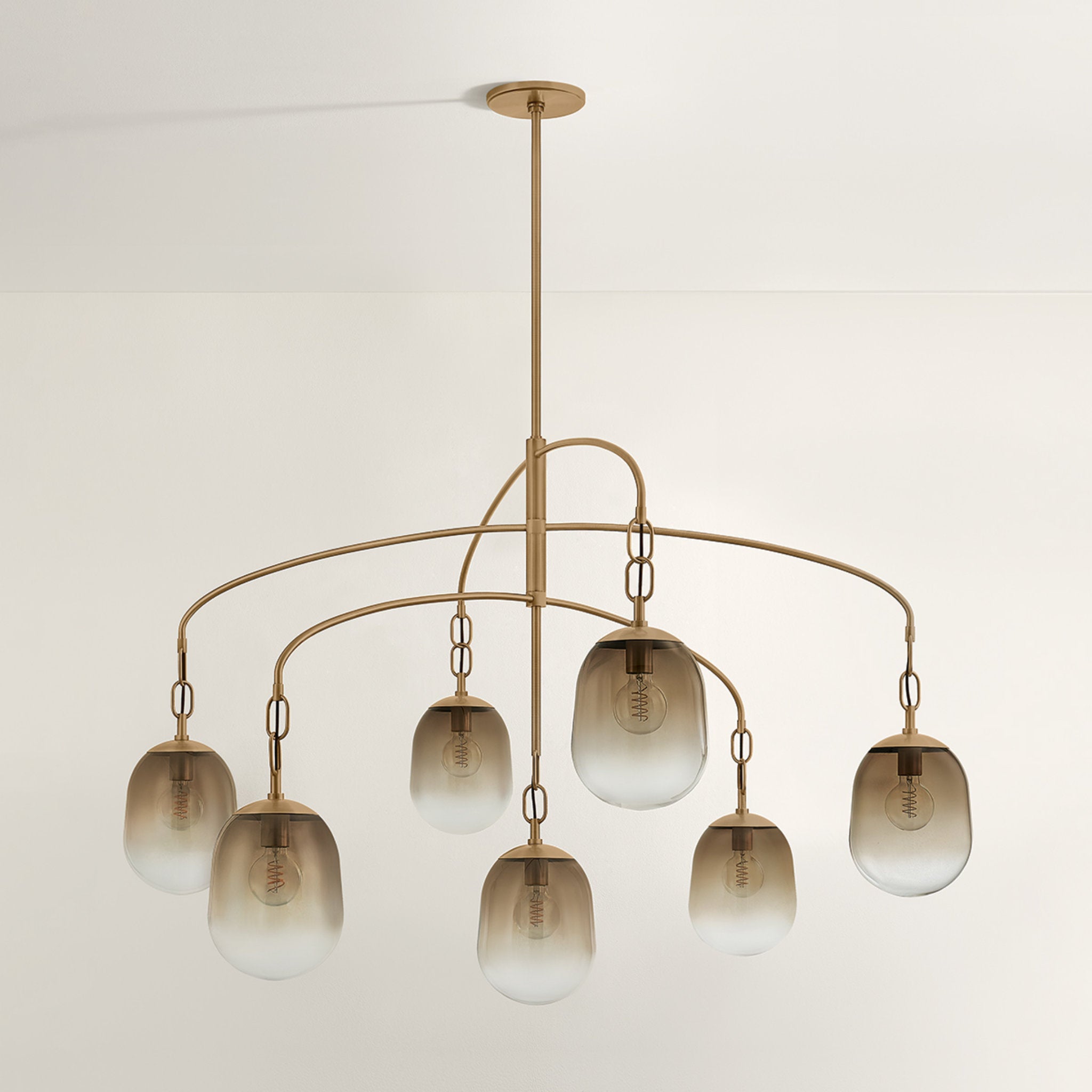Harvey 7-Light Chandelier in Patina Brass 59W x 38.5H