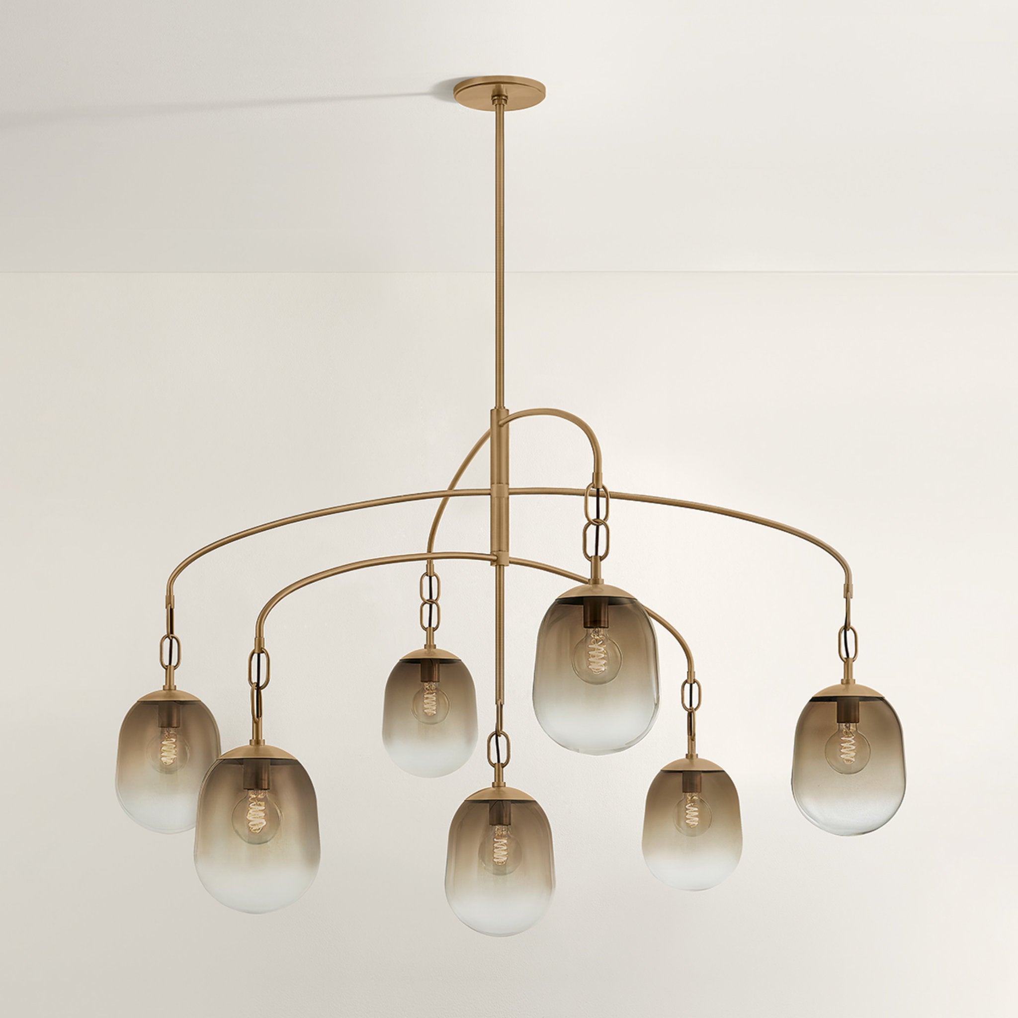 Harvey 7-Light Chandelier in Patina Brass 59W x 38.5H
