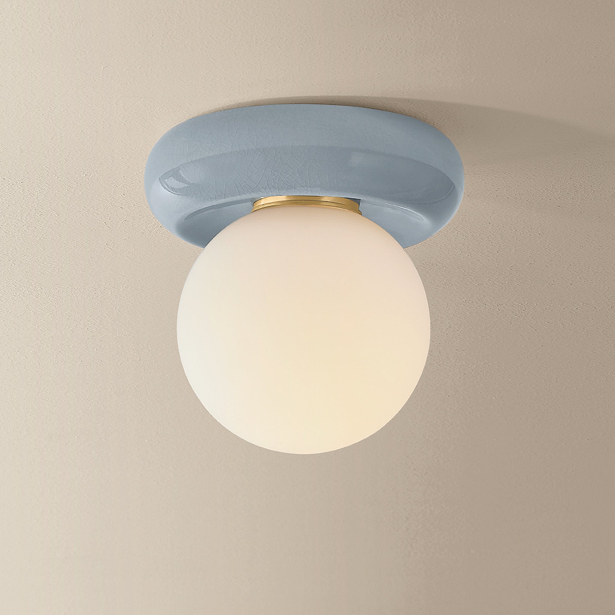 Tyra 1-Light Flush Mount in Aged Brass 8.75W x 6H