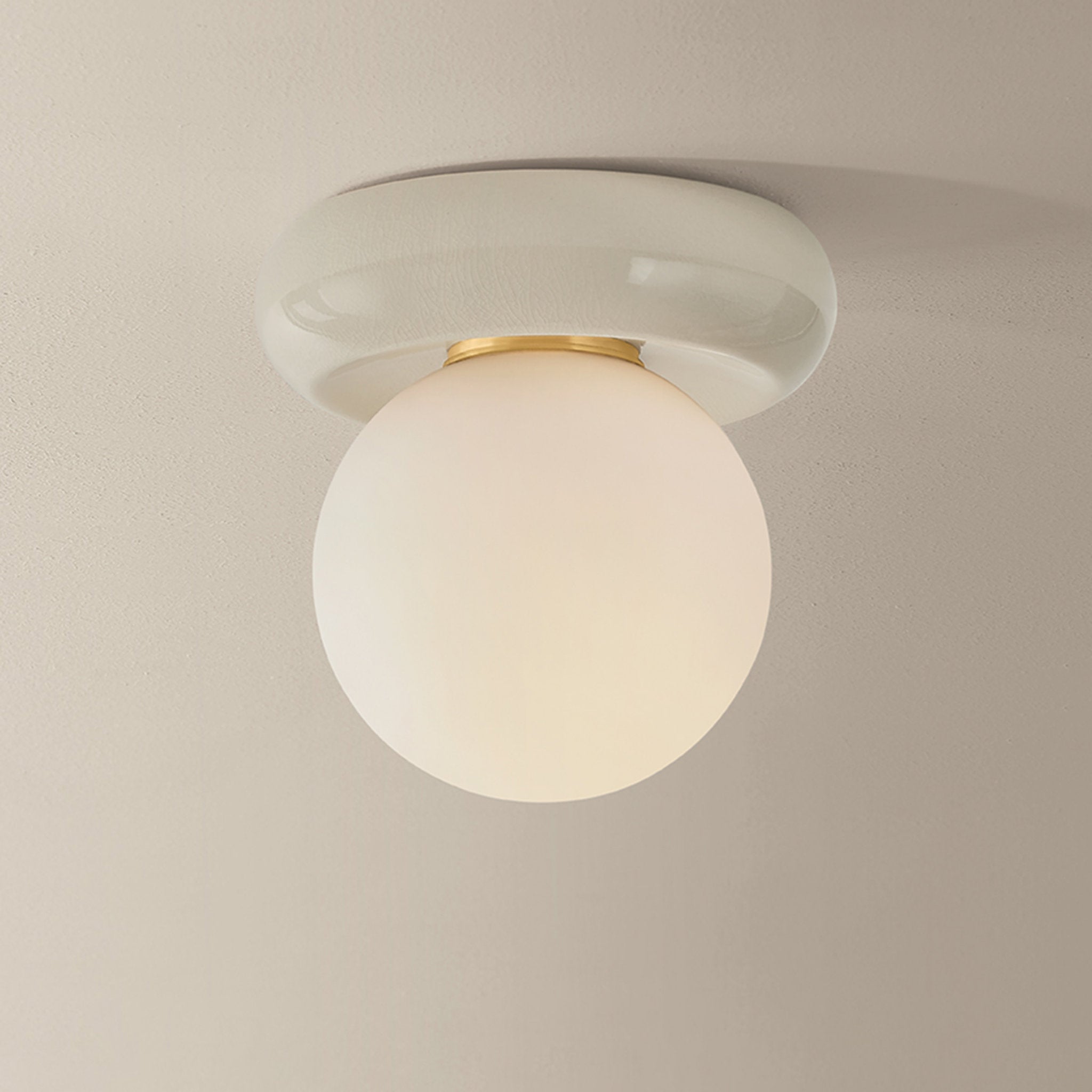 Tyra 1-Light Flush Mount in Aged Brass 8.75W x 9H