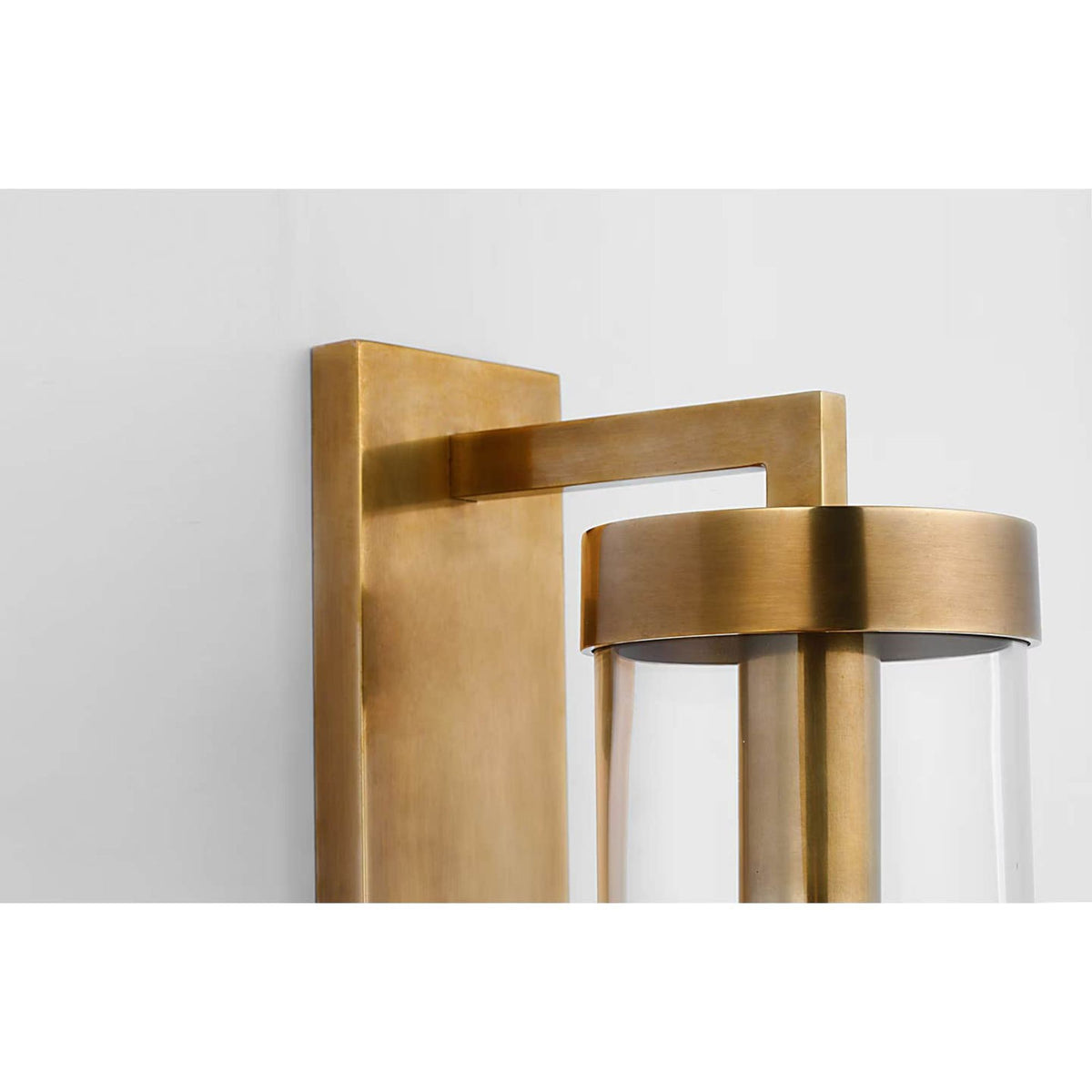 Kelly Wearstler Liaison Large Bracketed Outdoor Wall Sconce in Antique-Burnished Brass with Clear Glass W4.75" x H20" x E8"