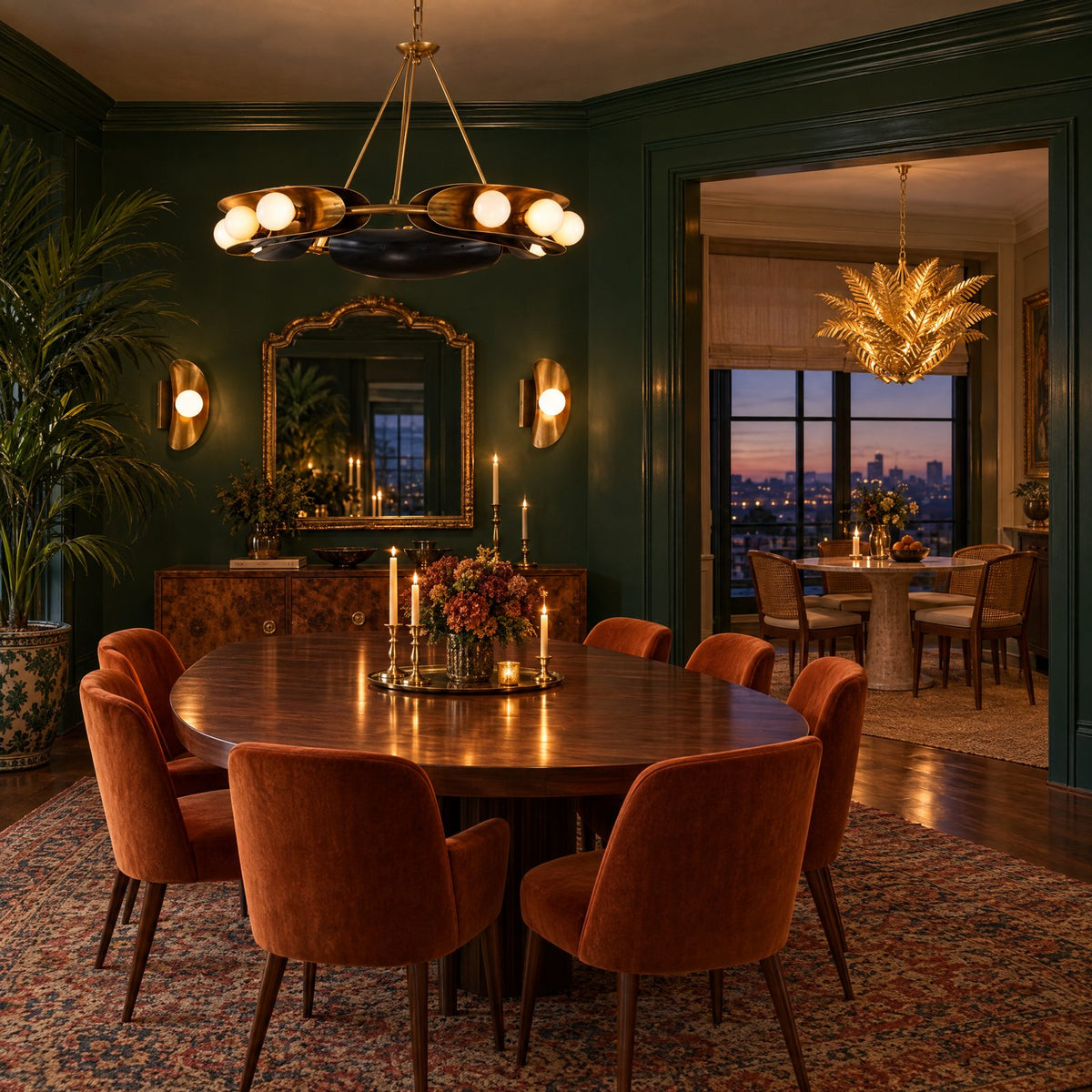 Shop the look: Eclectic green dining room with a Martyn Lawrence Bullard Hopper vintage brass chandelier for Corbett, Hopper sconces flanking a gilded mirror, and a Tropicale gold leaf chandelier in the breakfast room