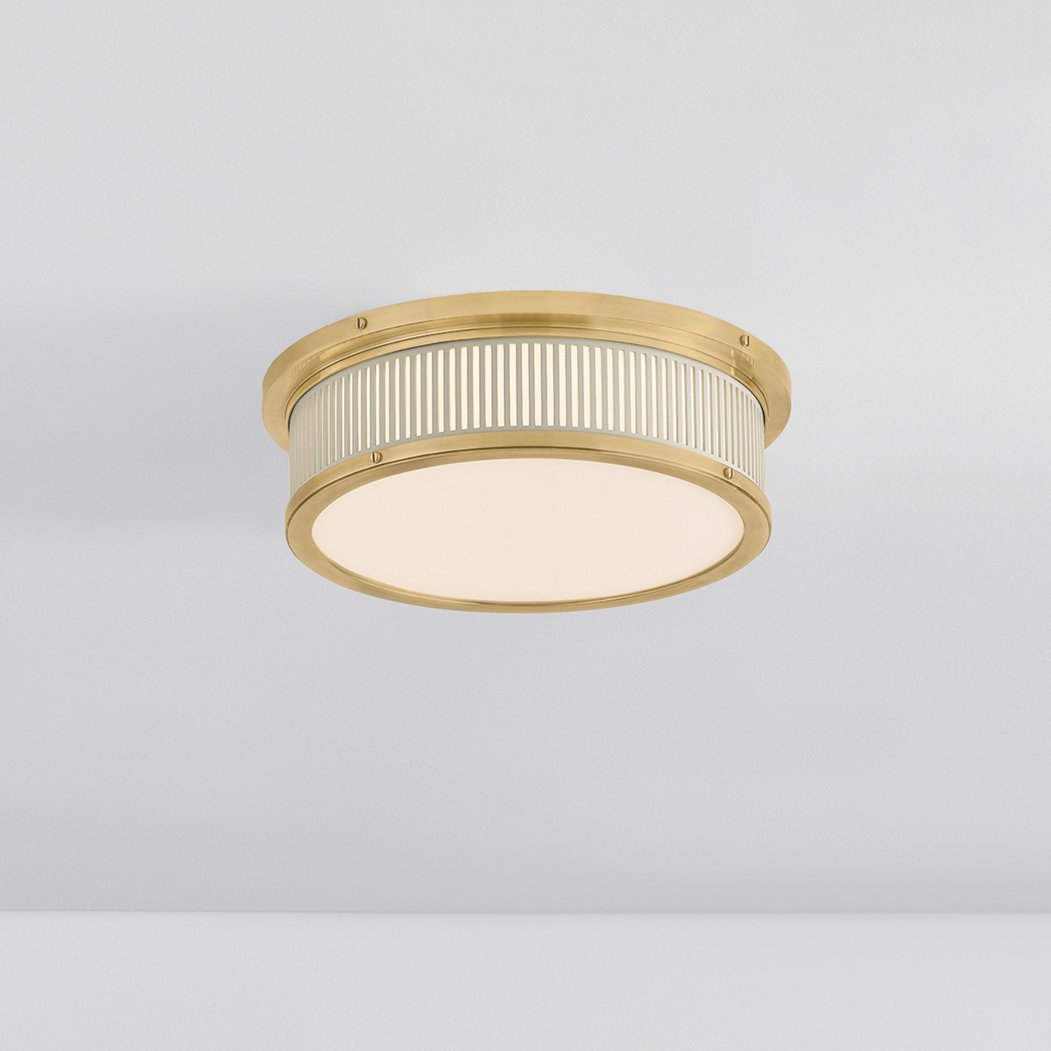 Ashdown 1-Light Flush Mount in Aged Brass by Mark D. Sikes 14W x 4H (Off-White)