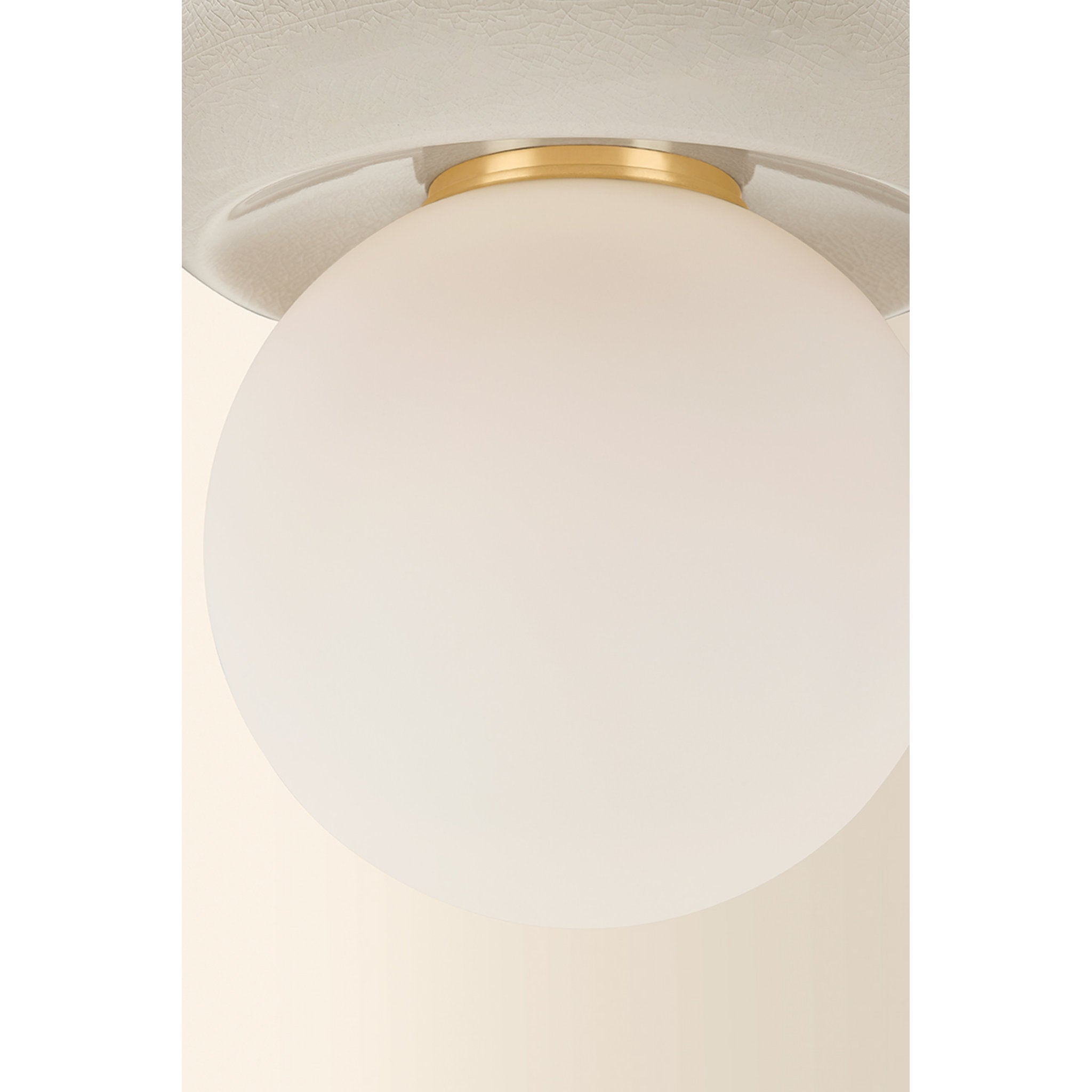 Tyra 1-Light Flush Mount in Aged Brass 8.75W x 9H