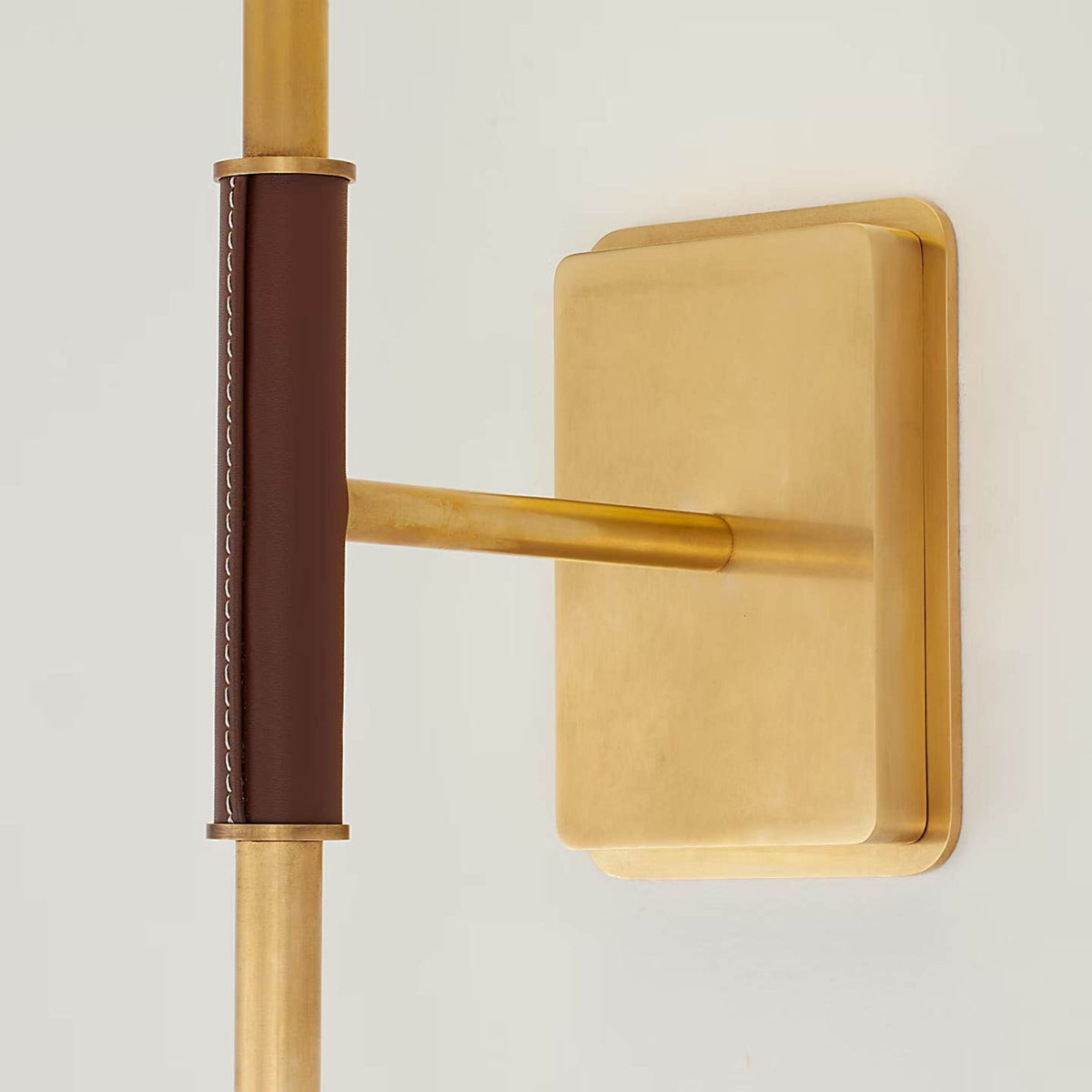 Amber Lewis Griffin Sconce in Hand-Rubbed Antique Brass and Saddle Leather with Linen Shade W5.75" x H15.75" x E7.25"