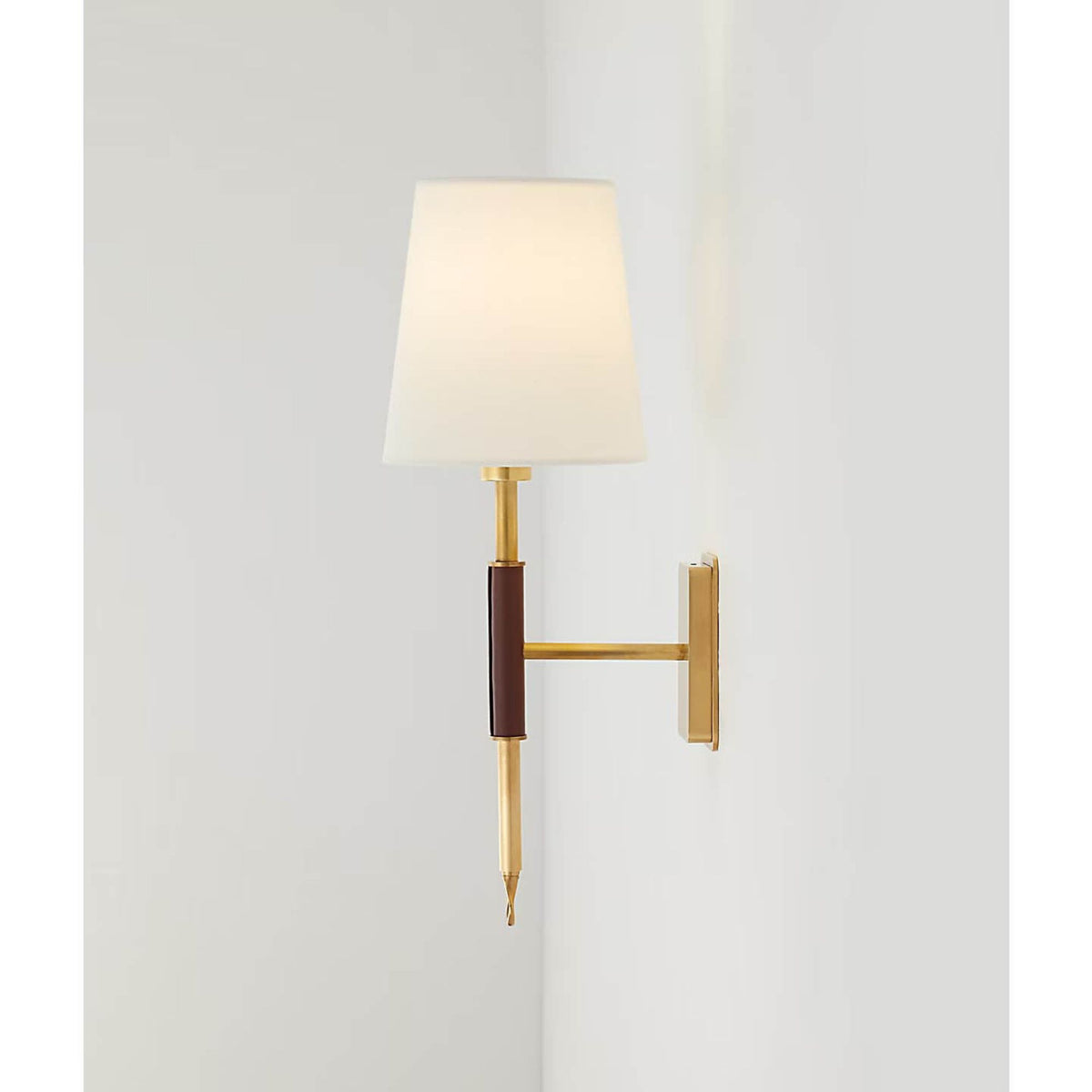 Amber Lewis Griffin Sconce in Hand-Rubbed Antique Brass and Saddle Leather with Linen Shade W5.75" x H15.75" x E7.25"