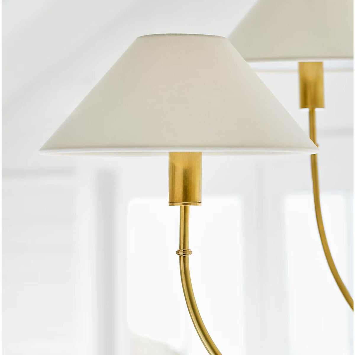 Amber Lewis Griffin Large Staggered Tail Chandelier in Hand-Rubbed Antique Brass and Saddle Leather with Linen Shades W36.5" x H35.5"