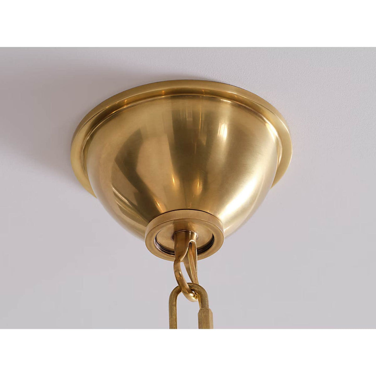 Amber Lewis Griffin Grande Tail Chandelier in Hand-Rubbed Antique Brass and Saddle Leather with Linen Shades W56" x H26.5"