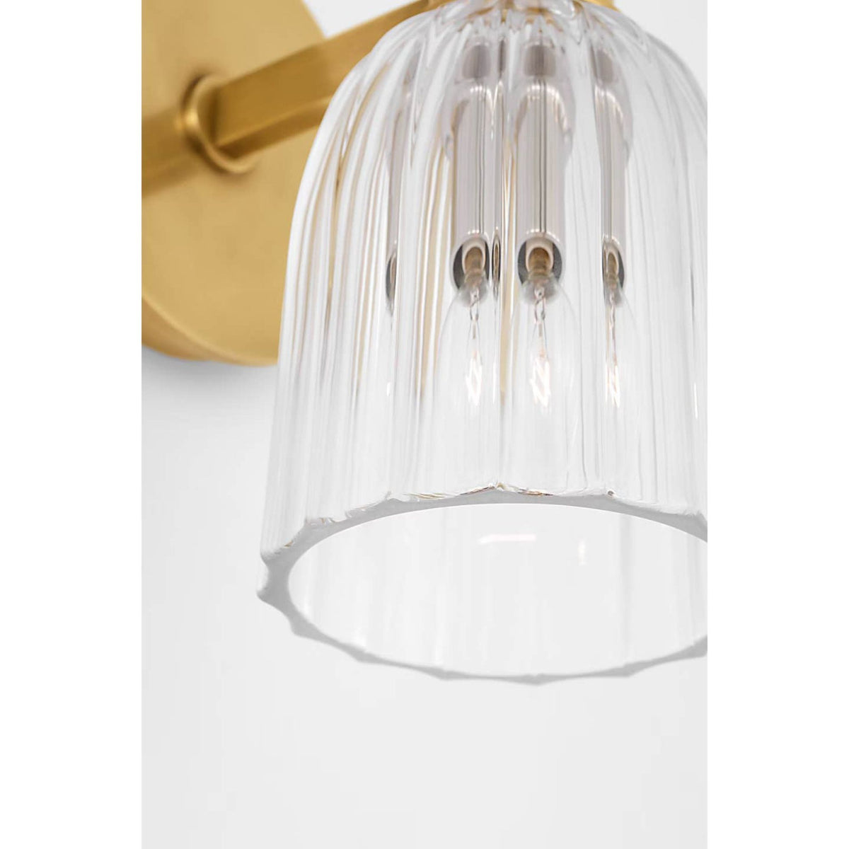 AERIN Asalea Single Sconce in Hand-Rubbed Antique Brass with Clear Glass W5" x H8.5" x E7"
