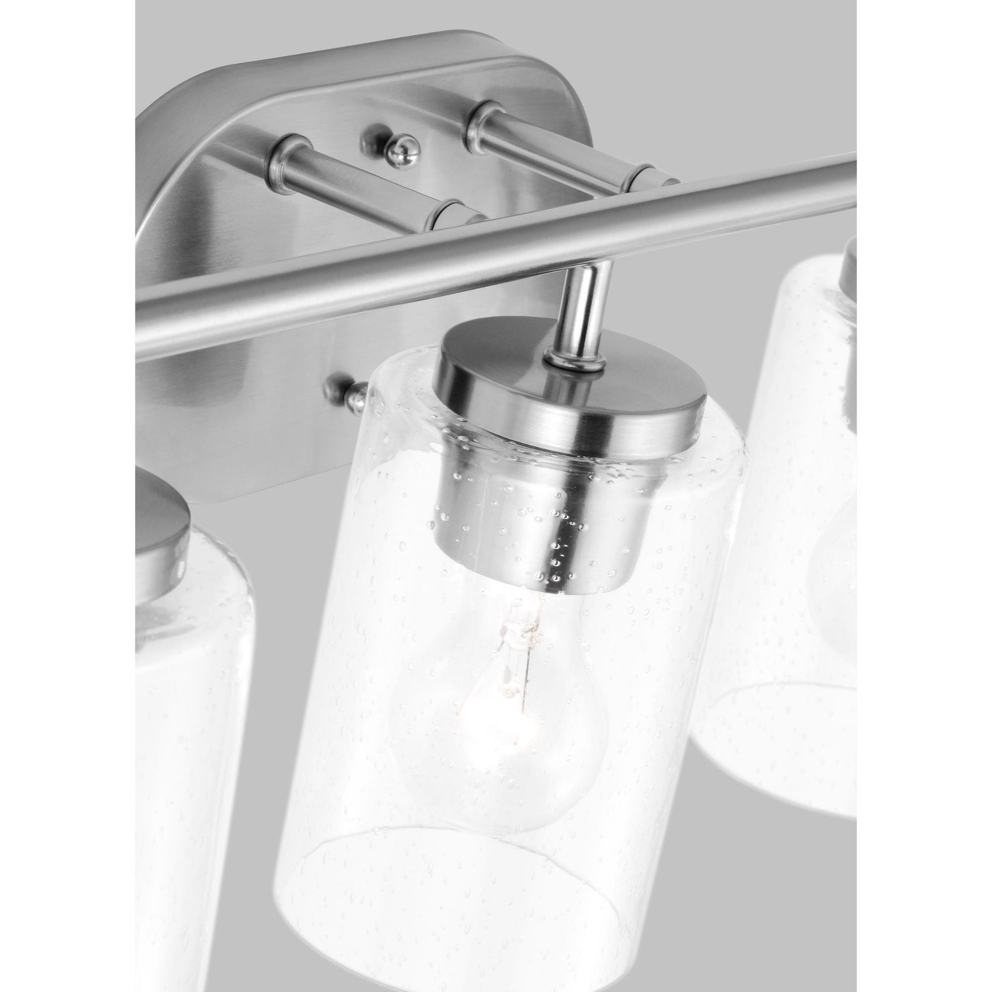 Oslo Three Light Wall / Bath Contemporary Fixture 20" Width 8.5" Height Steel Round Clear Seeded Shade in Brushed Nickel